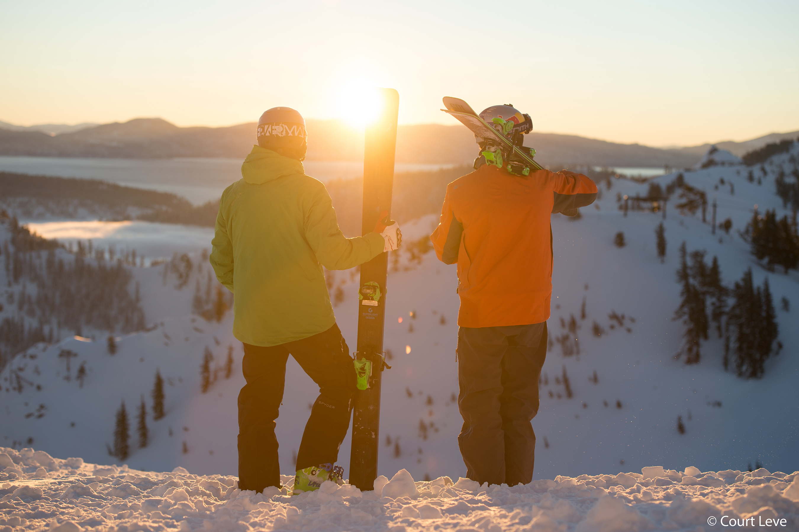 Two skiers on top of mountain