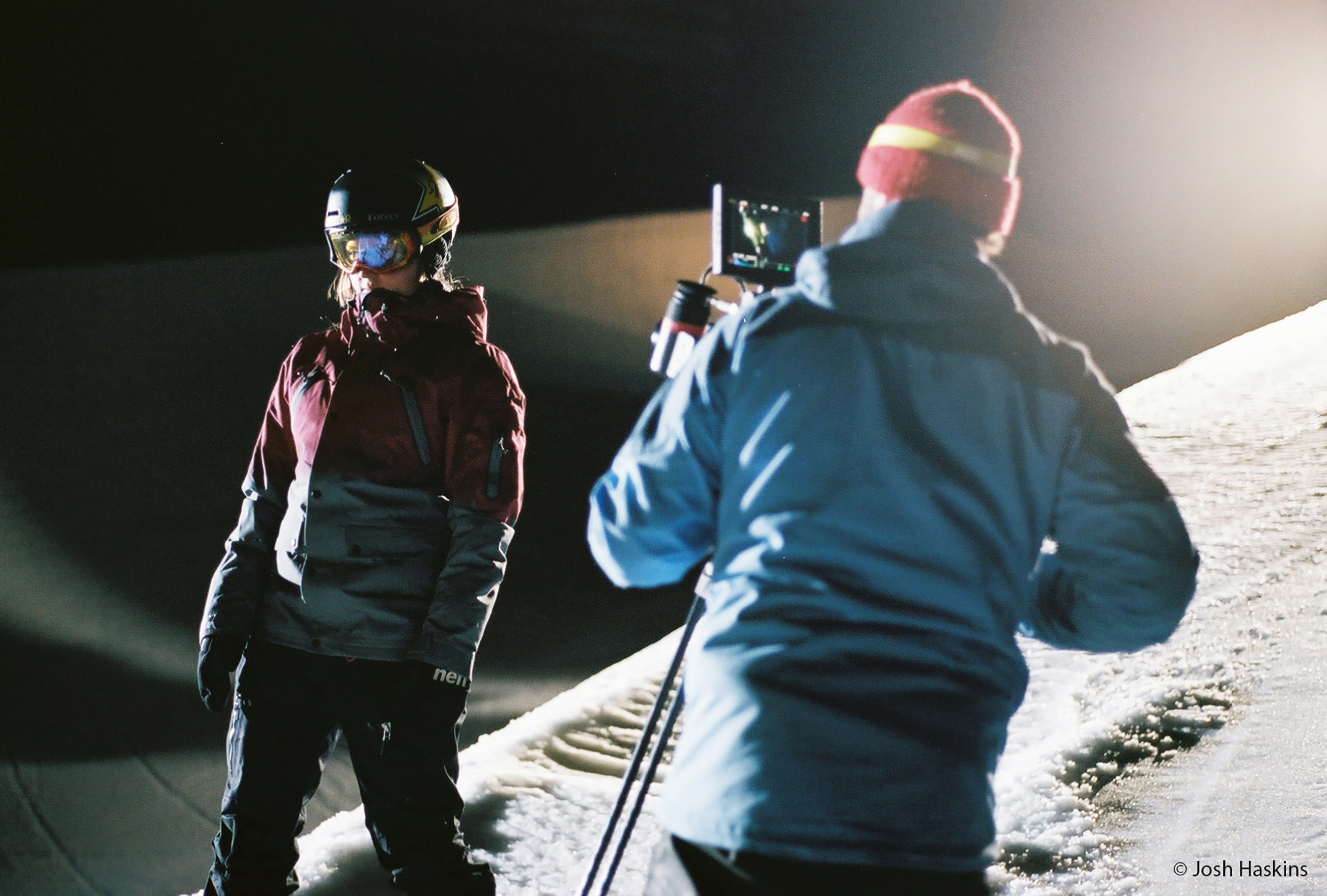 Warren Miller Videographers film snowboarder